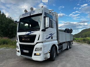 camião de caixa aberta MAN TGX 26.560 Flatbed truck with Hiab 138 crane from 2018. Rear mou
